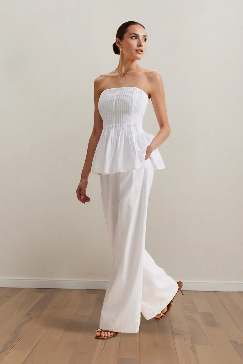 White Pintuck Peplum - Walking Stride Hand in Pocket